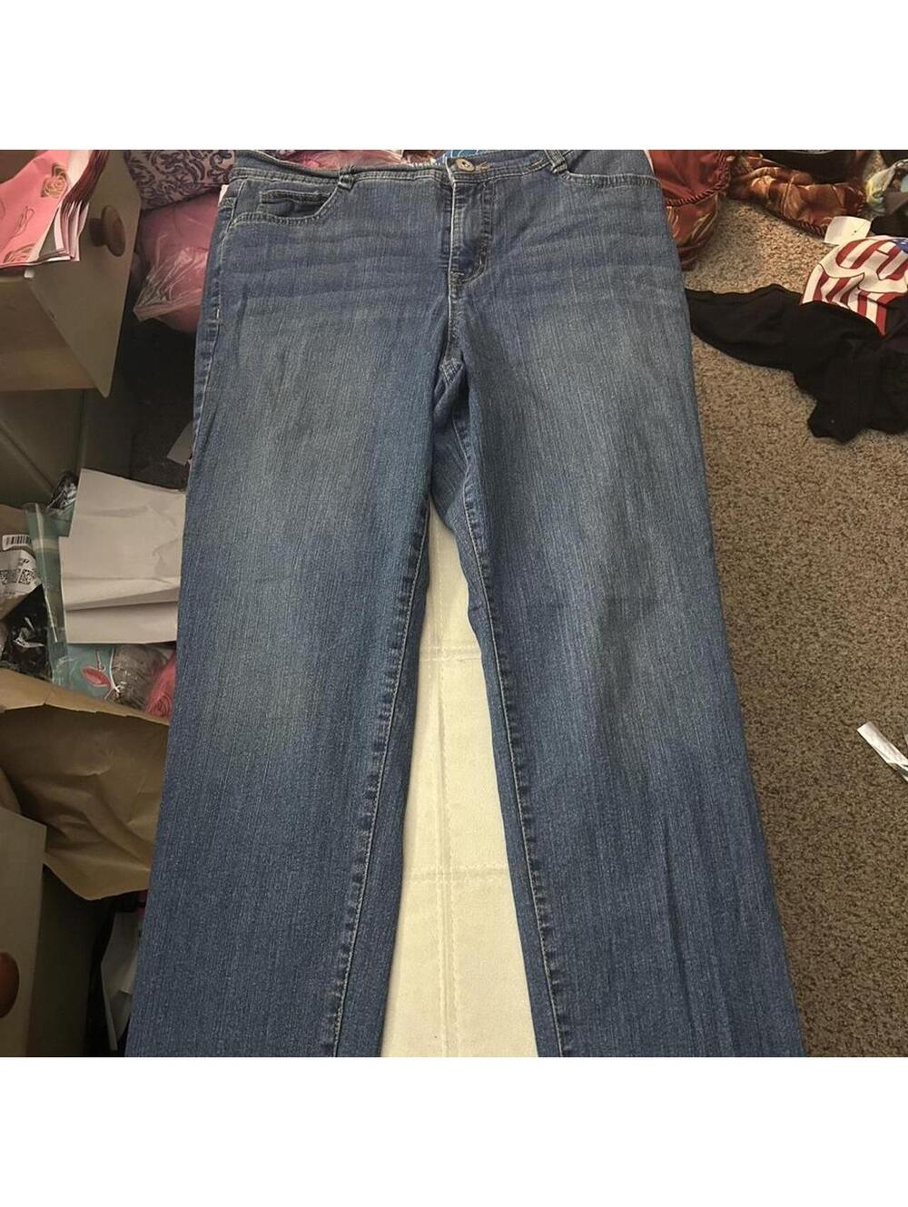 Style Co. blue jeans with a straight leg fit and tummy control. Size: 12